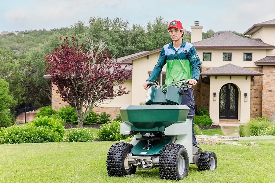 riding-seeder-on-lawn